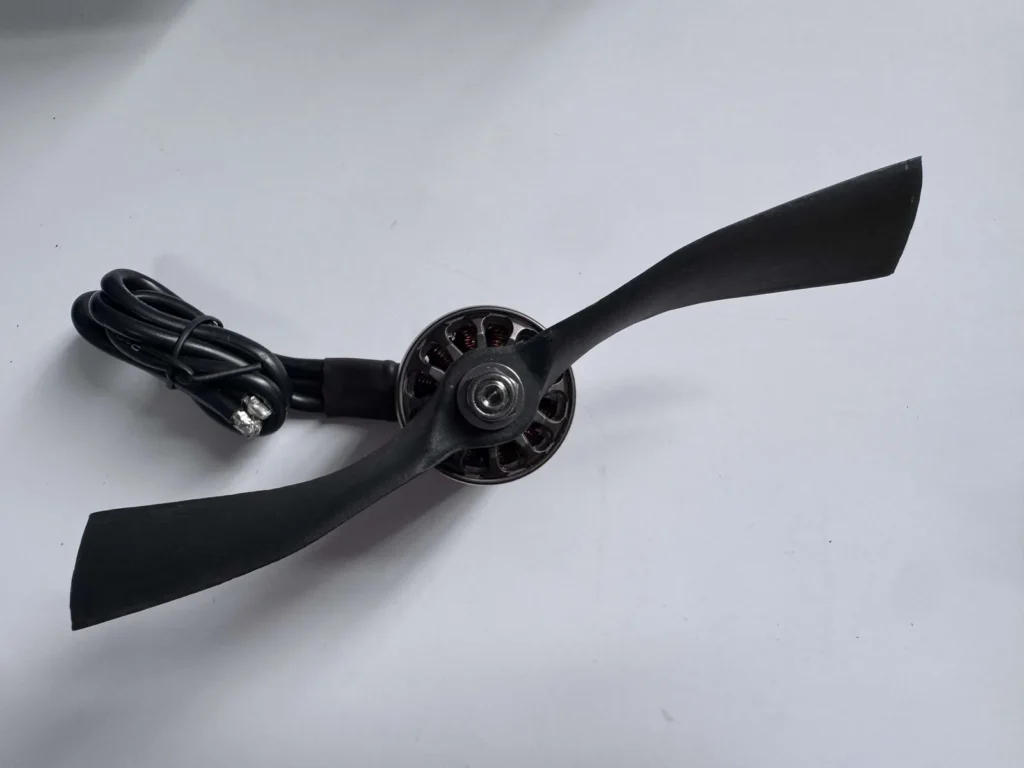 UAV electric powertrain: brushless motor with folding propeller, front view